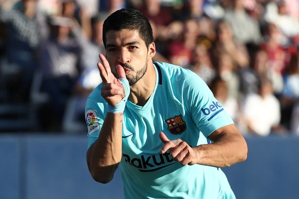 Suarez comes back to life with two goals and leads Barca to 3-0 victory